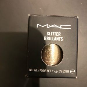 MAc glitter in color Reflects Antique Gold